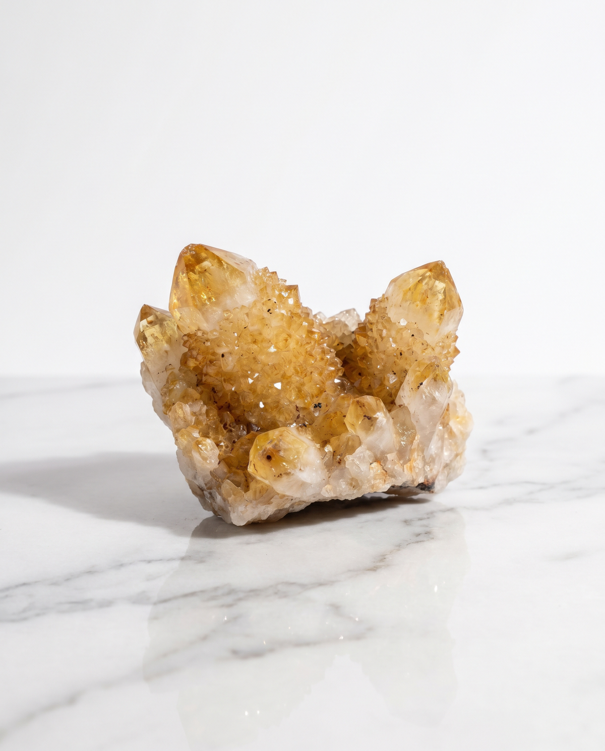 Natural Citrine Cluster for money and abundance on white marble – Horocosmo