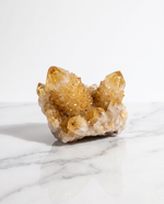 Natural Citrine Cluster for money and abundance on white marble – Horocosmo