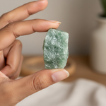 Green Aventurine held in hand for scale, certified crystal – Horocosmo