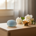 Blue Chalcedony stone on a meditation altar with brass diya – Horocosmo