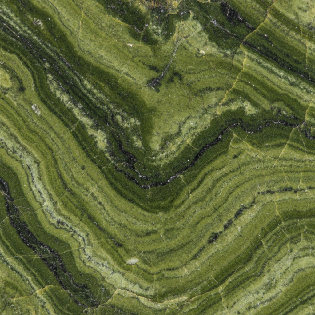 Macro of natural Serpentine showing mottled green snakeskin pattern – Horocosmo