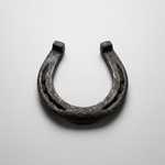 Genuine iron lucky horseshoe – representative image; hand-forged, shape varies