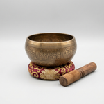 Tibetan singing bowl with striker and cushion – representative image; hand-finished, tone varies
